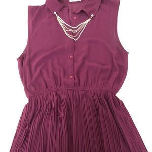 Maroon sleeveless dress with gold hardware